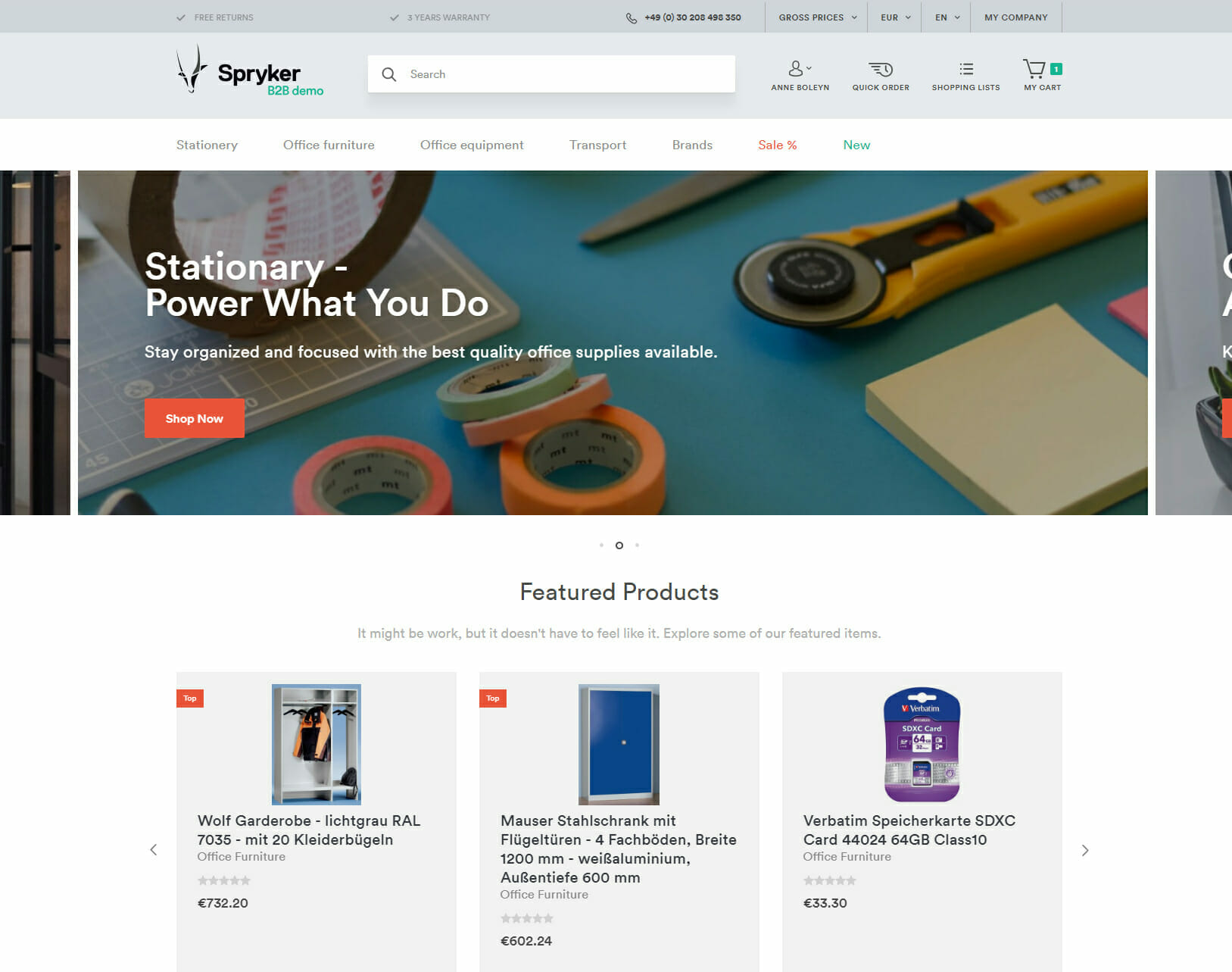 Online store homepage featuring a stationary banner with various office supplies, and a "Featured Products" section showcasing three office furniture items with brief descriptions and images, catering to both B2B Commerce and B2C Commerce needs.