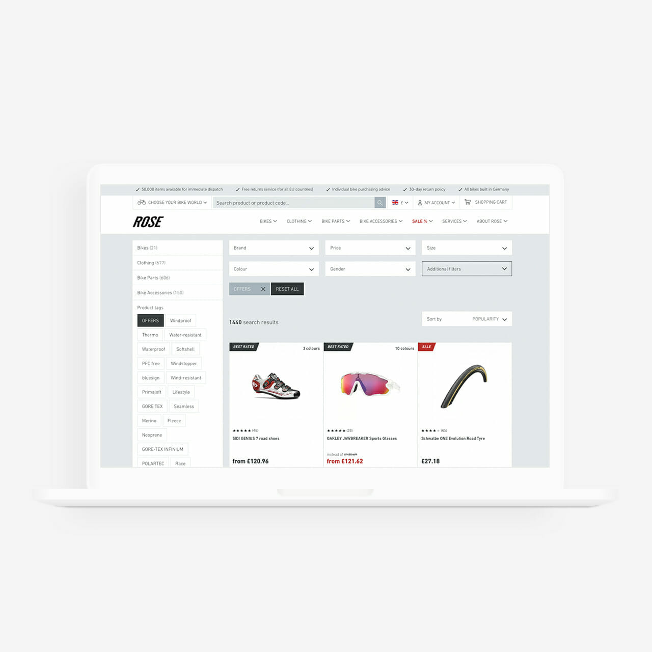 A laptop displaying a technology-packed webpage from ROSE Bikes shows a search results page for 'sale' items, featuring cycling shoes, sunglasses, and a bicycle pump perfect for the next race.