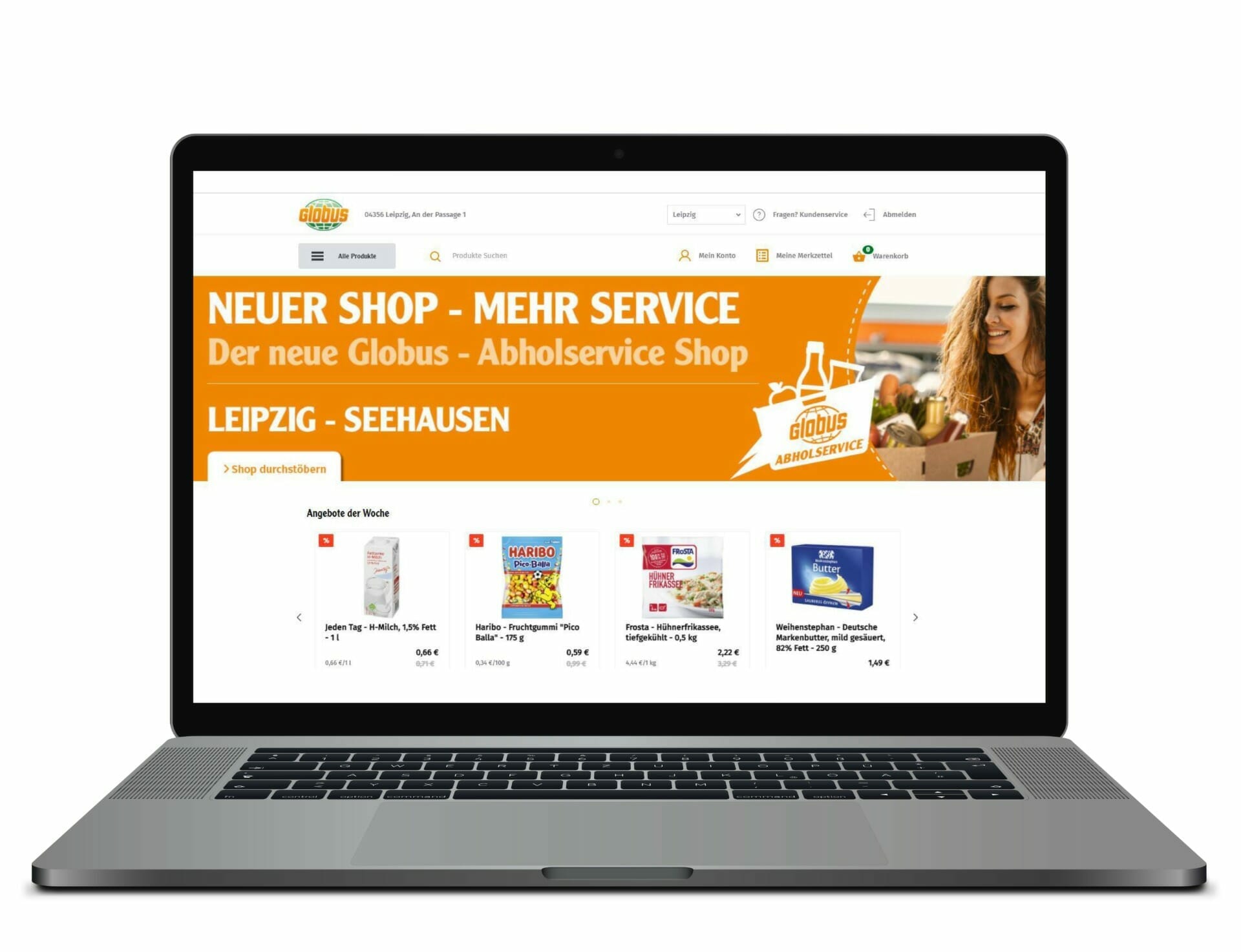 Laptop displaying a webpage for the Globus grocery pick-up service. The page features promotional text about exciting new services and product offerings from Globus.