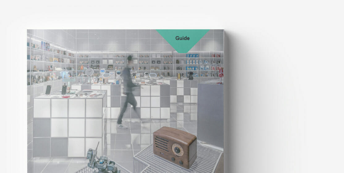 A guide cover showing a futuristic store with electronics and gadgets displayed on grid-style shelves. The minimalist design perfectly exemplifies the sleek environment ideal for starting a marketplace. A person is walking through it, inspired by the innovative setup.
