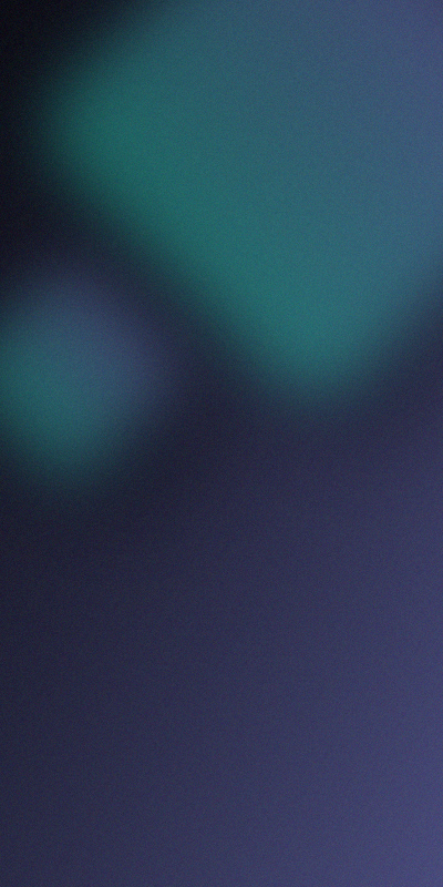 A blurred abstract image with shades of green and purple on a dark background.
