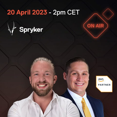 Promotional image for a Spryker event scheduled on April 20, 2023, at 2 pm CET. The image features two smiling individuals, the Spryker logo, an "On Air" sign showcasing our onair status, and an AWS Partner badge.