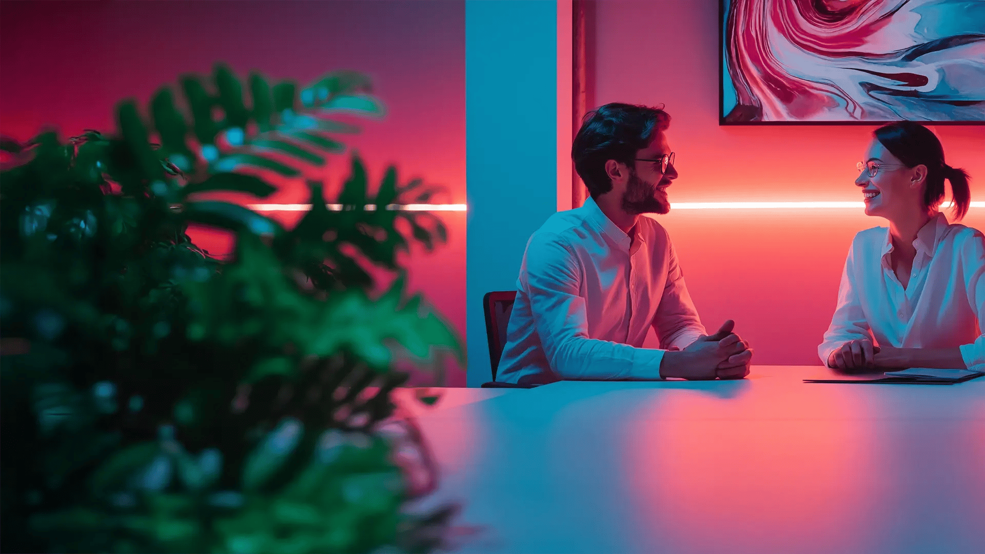 man-woman-discussing-office-hero-image
